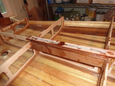  The wooden fin box is epoxied in place. 