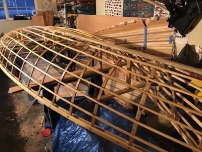  12/8/17 - The underside of the wood frame is sealed with epoxy and the keelson is fiberglassed. 