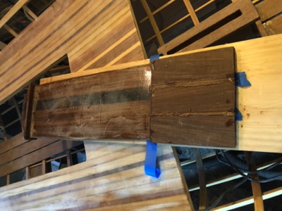 3/13/18 - pieces of ironwood are epoxied to the bottom of the daggerboard. 