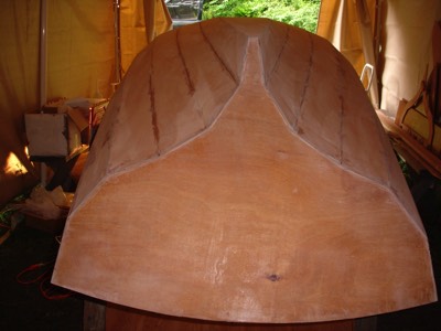  The hull is then sanded smooth in preparation for fiberglassing. 