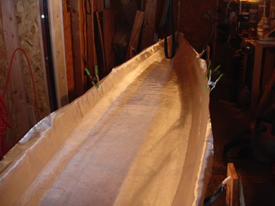  Fiberglass cloth is laid on the interior of the hull. 