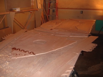  1/29/11 - The bulkheads are laid out for fiberglassing. 
