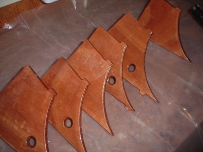  2/14/11 - The coaming gussets are given 3 coats of epoxy. 