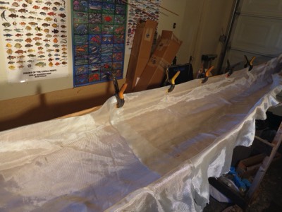  4/6/16 - Fiberglass cloth is laid in the hull. 