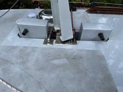  10/23/22 - The final step of construction. Holes for the keel safety pins were drilled when the boat was launched. Now filled with carbon tubes which will be cut off.  