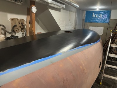  1/11/21 - After several coats of primer, the first coat of copper free bottom paint is applied. 